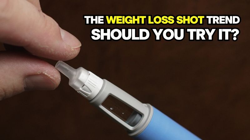 A hand holding a weight loss injection pen, illustrating the trend of weight loss shots in North America.